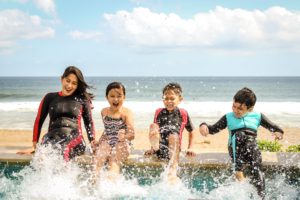 a group of people in the water