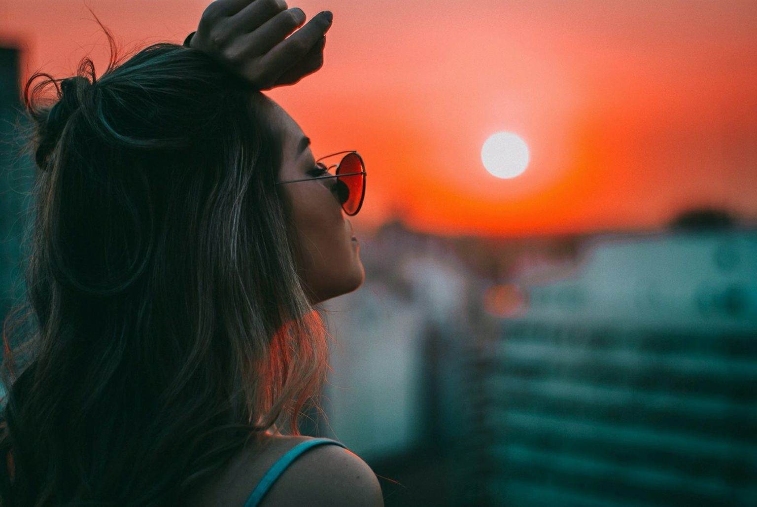 a woman with her head in her hand