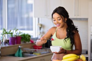 a woman cooking in the kitchen