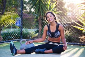 a woman sitting on a trampoline