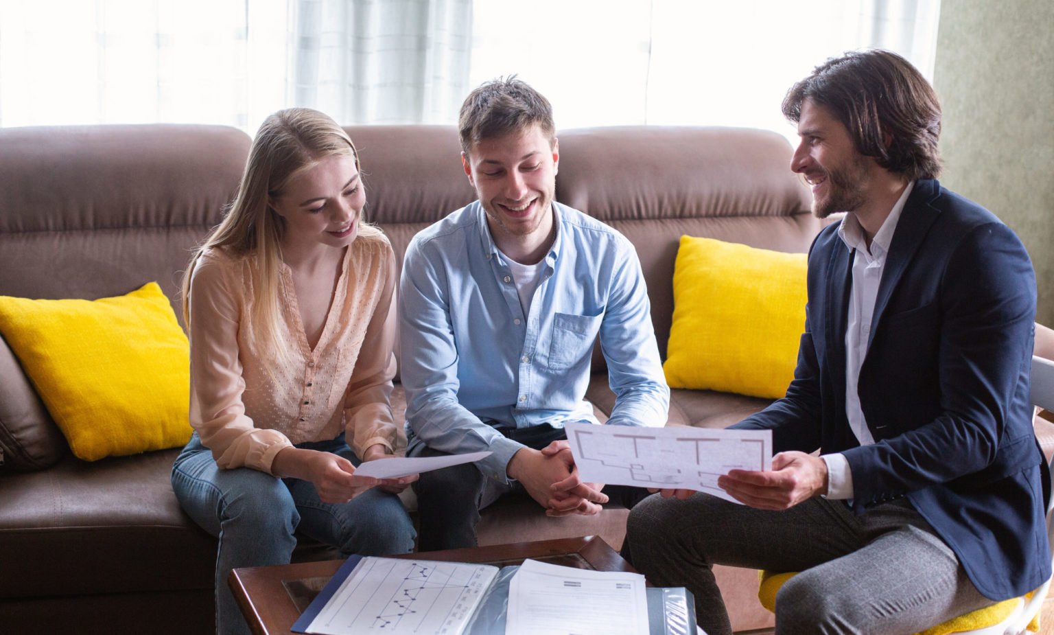 a group of people sitting on a couch