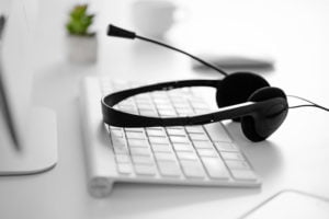 a pair of headphones on a keyboard
