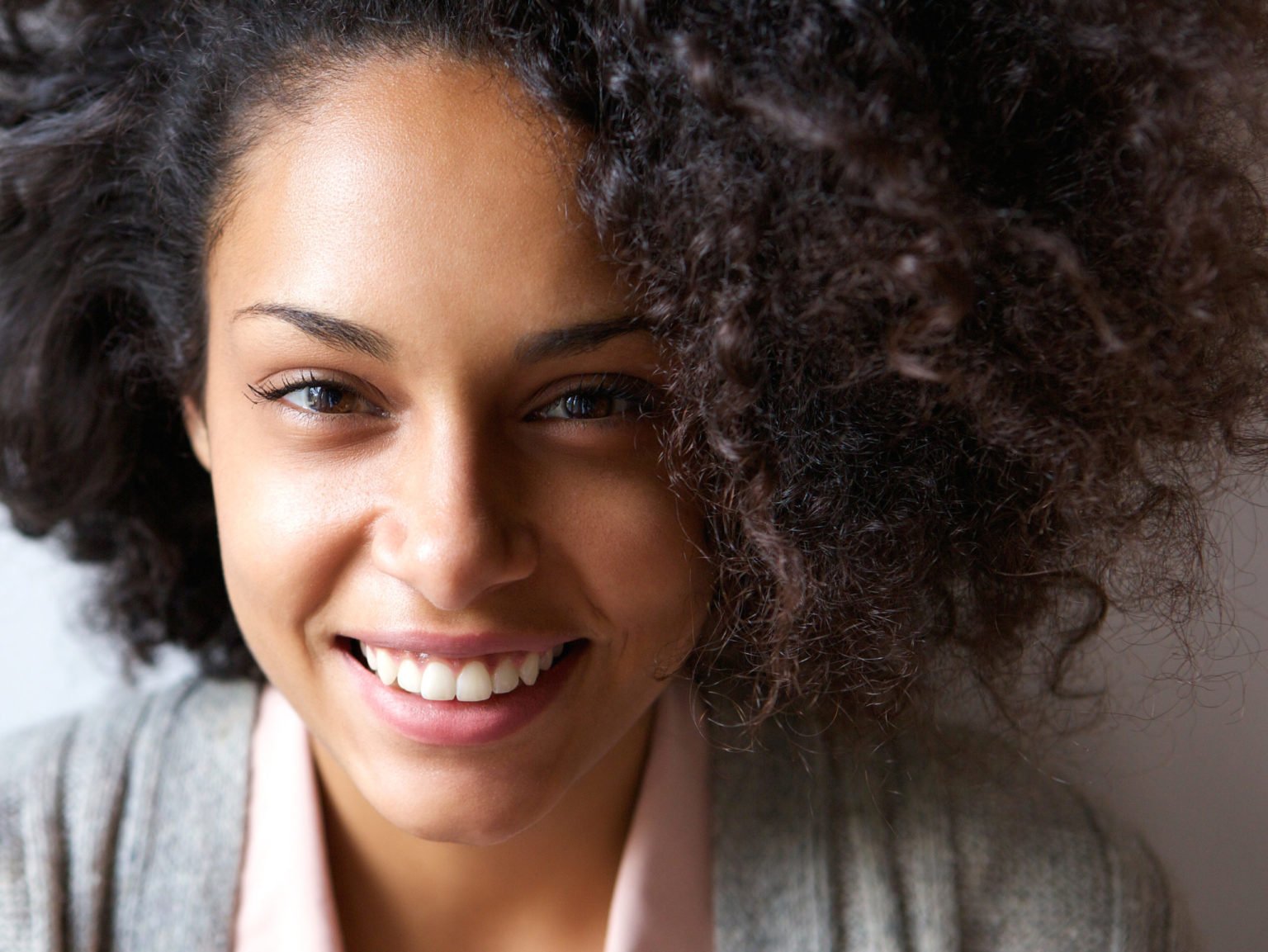 a woman smiling for the camera